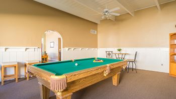 Riverstone clubhouse with pool table and lounging area